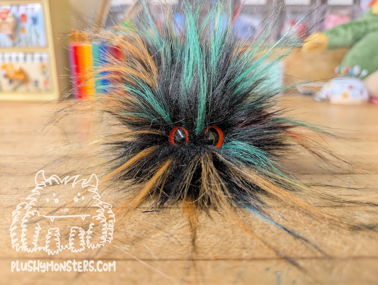 Fireworks Tiny Boi with Safety Orange Slit Pupil Eyes!
