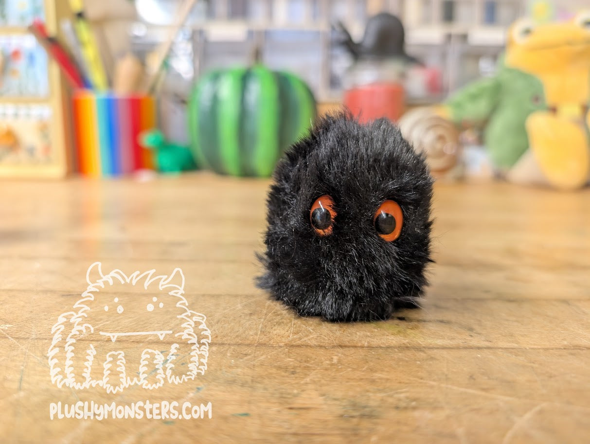 Soot Tiny Boi with Orange Oval Eyes!