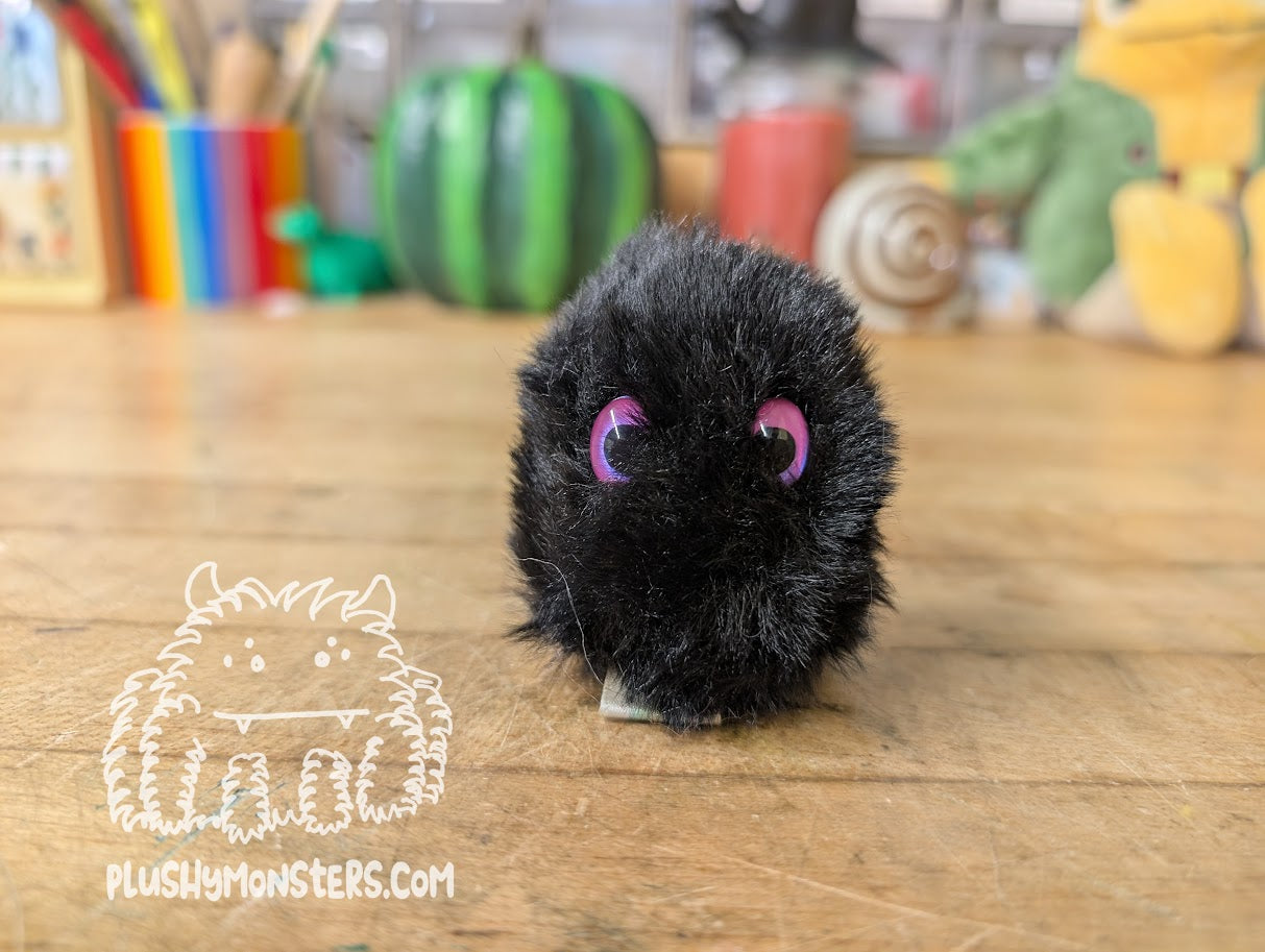 Soot Tiny Boi with Fuchsia Oval Eyes!