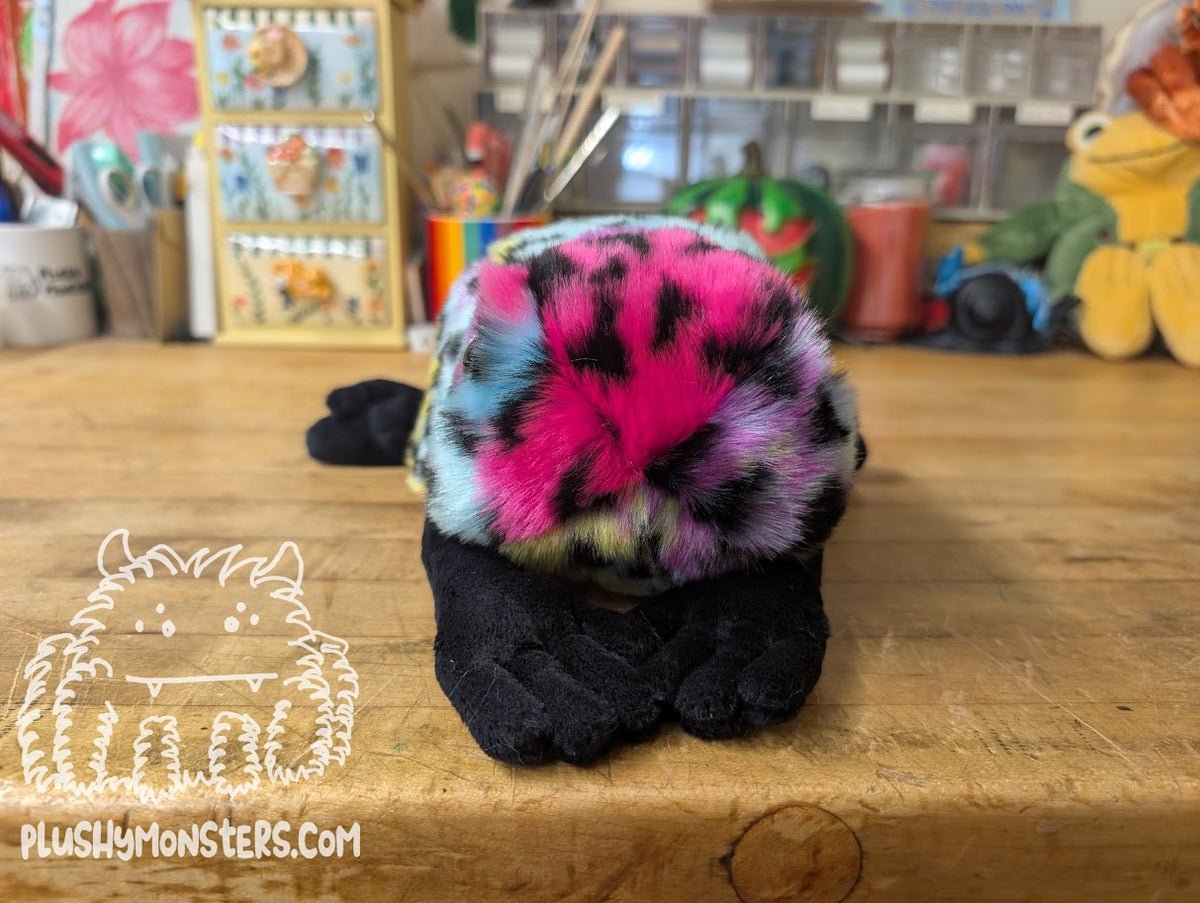 Quite Startled Rainbow Leopard! - Little Weighted Nerd